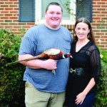 Jason and Leslie Cleckler raise more than 14,000 pheasants on their farm.