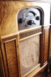 This 1930 Atwater Kent radio once belonged to Schiermann's great-grandfather. At right, he sits by another example of his many antique radios.