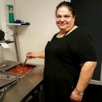 Sonia Bertolone-Carrillo prepares to serve authentic Italian cuisine to hungry customers.